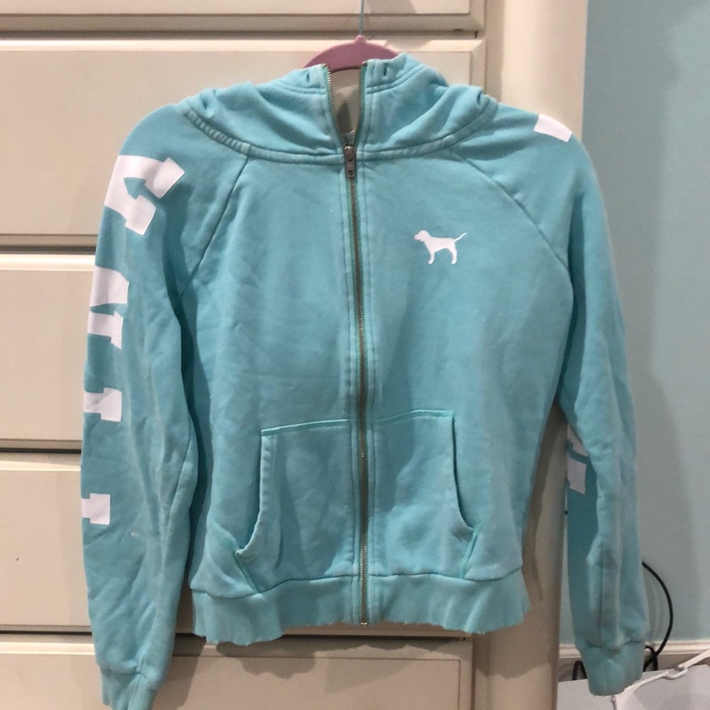 The brand pink jacket in the color blue